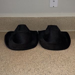 Two black felt cowboy hats